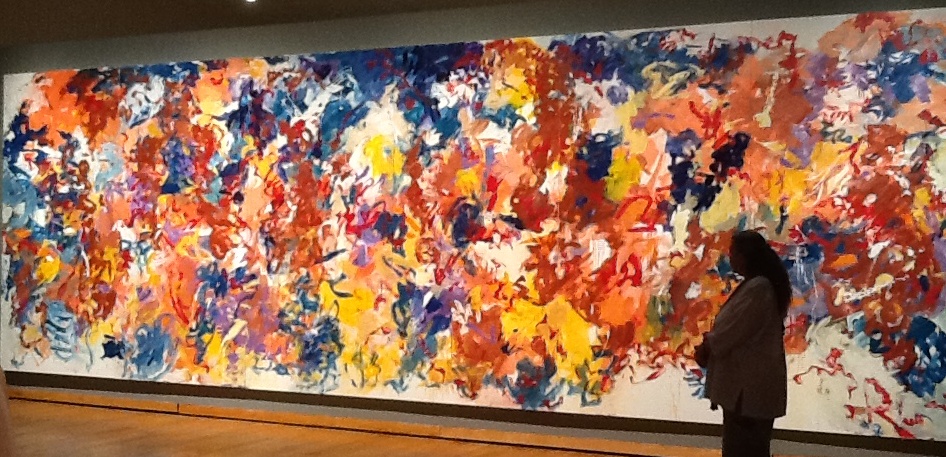 Neltje in front of her Moroccan Suite I, 2012, one of four 10 x 30-foot paintings, at her 2013 solo exhibition, University of Wyoming Art Museum, Laramie