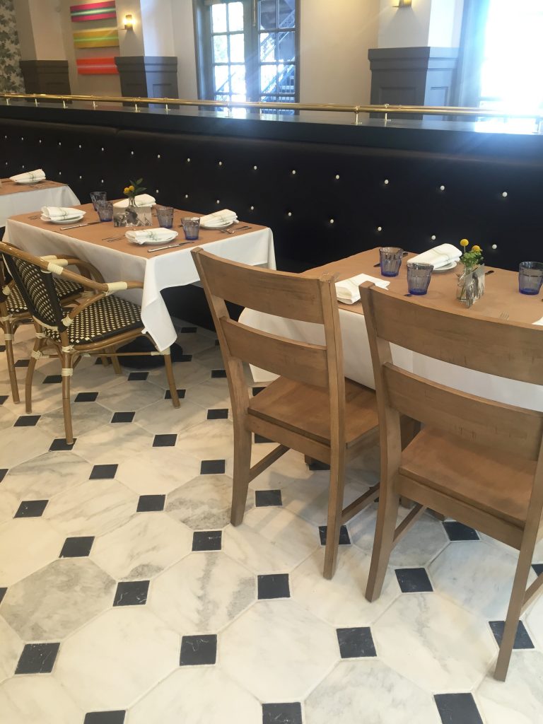 Each table is gifted an Eloise Nichols post card. 