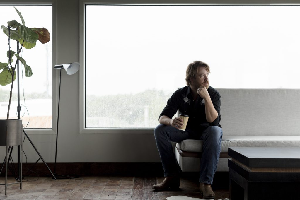 Will Thomas takes a moment at the top of White Oakl's Raven Tower.