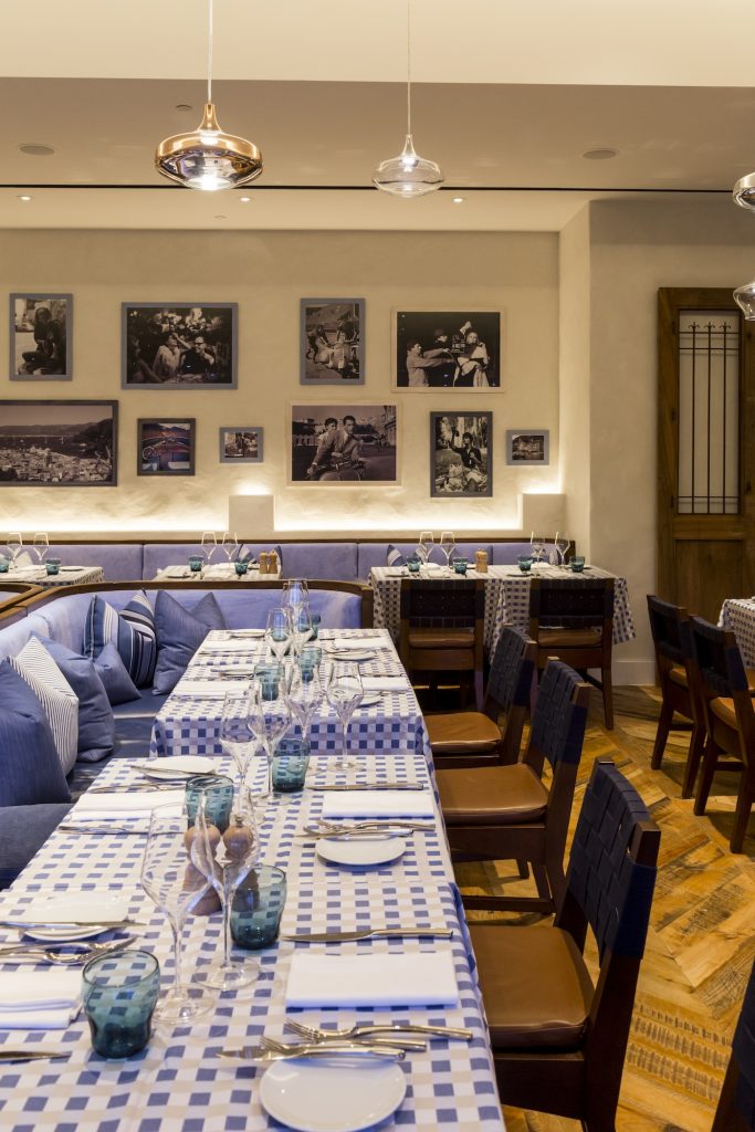Inside, vintage Italian photos hang on the walls.