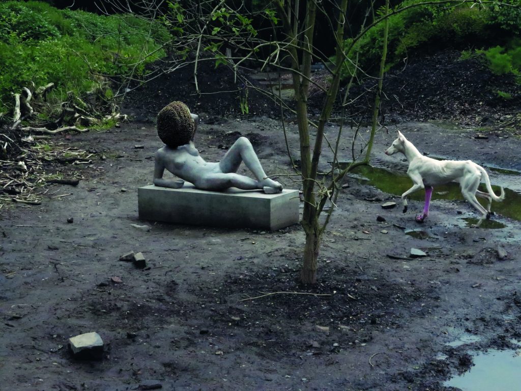 Pierre Huyghe's "Untilled (Liegender Frauenakt)," 2012, concrete cast with beehive structure, wax