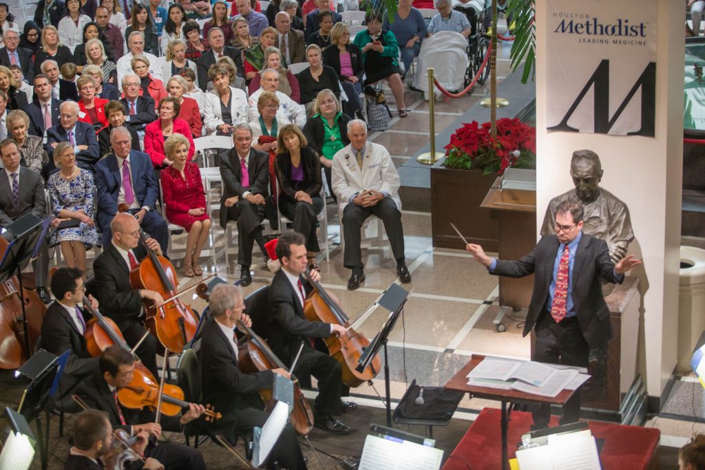 440_HM_PlatinumConcert2016.JPG_Houston Methodist Platinum Program Holiday Celebration featuring the Houston Symphony Holiday Concert in the Crain garden December 13, 2016. (Photo by Richard Carson)

***DOWNLOAD INSTRUCTIONS***
Download full resolution individual photos by clicking the "down" arrow below the preview images on the right hand side of the page. You can download all the images by clicking "download all" above the preview. 

This cloud based gallery will be available for three months in order to enable you to download all of the photos to your computer for safe long term storage. While the gallery may be in the cloud for longer than this time you should endeavor to file and secure the photos for future use in whatever manner you deem appropriate.