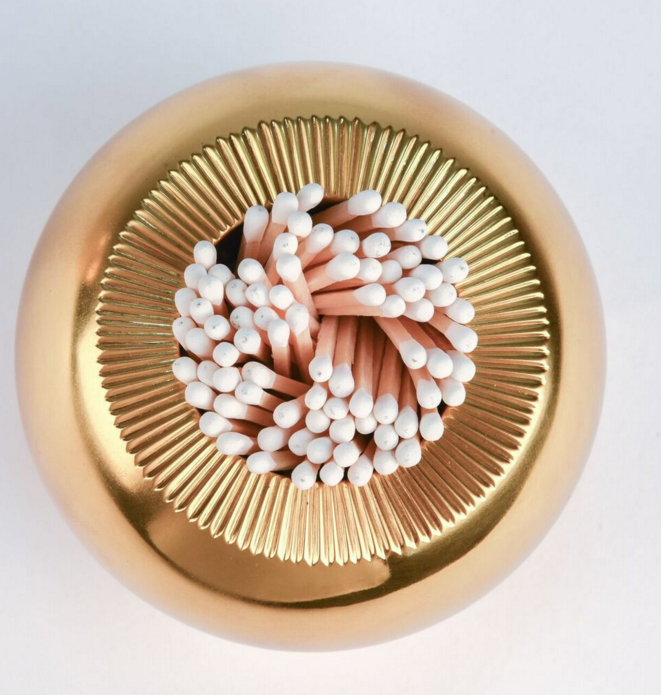 It's imperative to strike up a good conversation with your guests. Brass matchstick holder, $495, <a href="http://www.blueprintstore.com/">Blue Print Store.</a>