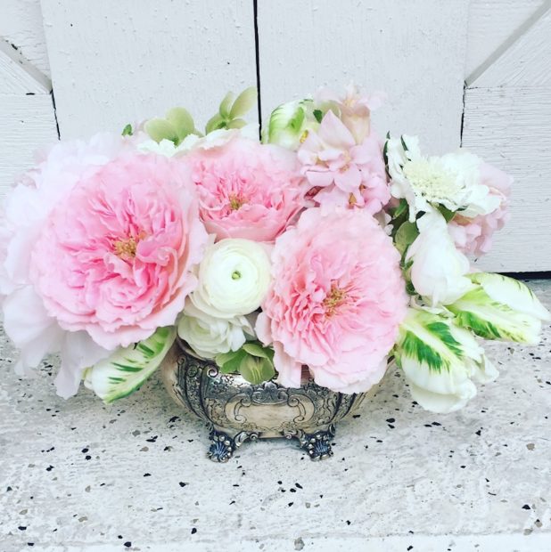 Peyton Riley arranges beautiful bouquets, like this one with cabbage roses and peonies.
