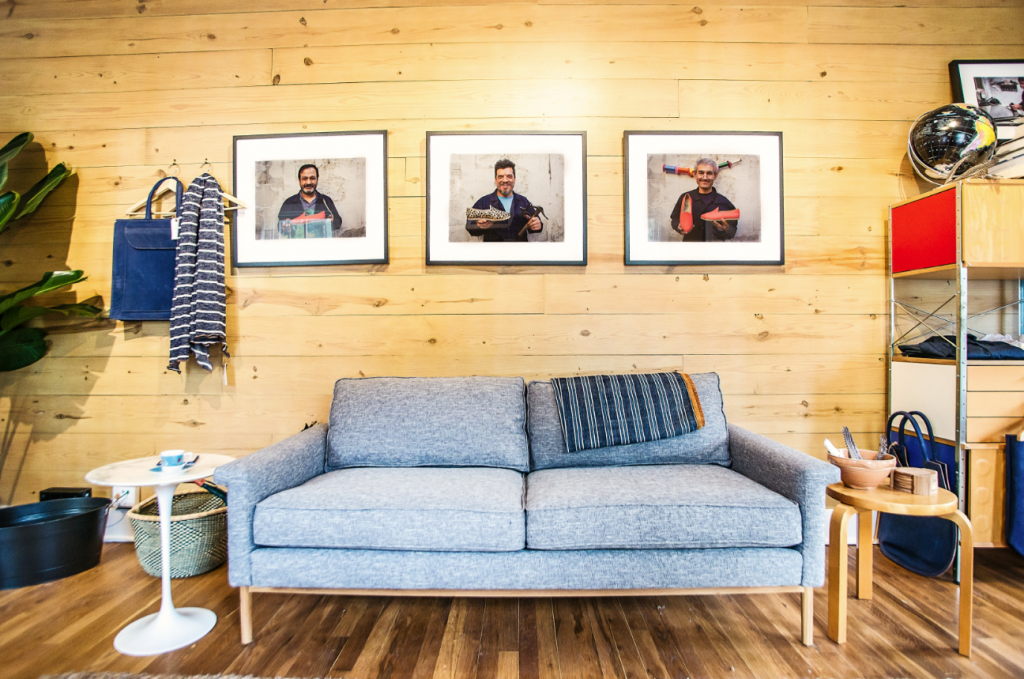 Portraits of Turkish craftsmen hang on the wall inside Sabah House Dallas. (Photo by Shayna Fontana)