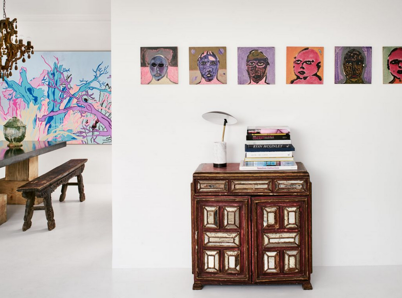 (2) Antique mirrored Mexican chest and marble-and-brass lamp. Untitled abstract portraits by Sergio Zenteno, circa 1980, from Dermot Begley, L.A.
