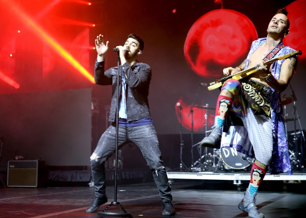 HOUSTON, TX - FEBRUARY 05:  Musicians Joe Jonas (L) and Cole Whittle of DNCE perform onstage at the Maxim Super Bowl Party on February 5, 2017 in Houston, Texas.  (Photo by Tasos Katopodis/Getty Images for Maxim)