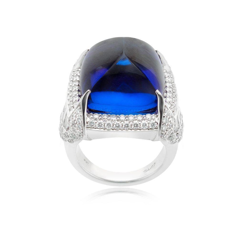 William Noble Tanzanite Ring: 18K white gold, tanzanite, and diamond ring with a 30-carat sugar loaf tanzanite accented with 3 carats of diamonds