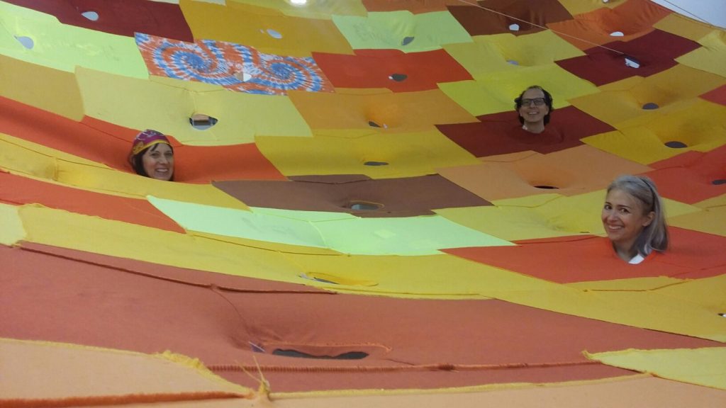 Pia Camil's installation of hundreds of tee shirts captivated at the Dallas Contemporary. The artist, based in Mexico City, made the viewer directly engage with global consumerism.