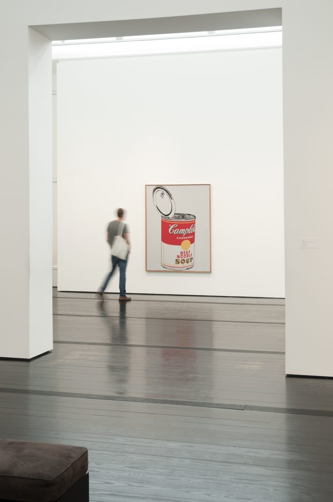 A visitor strolls through the modern and contemporary galleries of the museum that has always been free. 