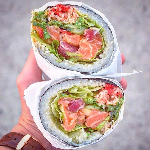 Your poke burrito awaits at Pokii Eatery. (Photo courtesy Pokii Eatery's Facebook Page via @fooodeelicious' Instagram account.)