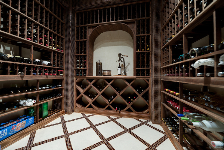 A temperature-controlled wine room is just one of the home's extravagant features. 