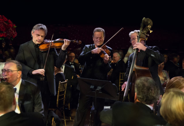 Orchestra musicians Sergei Galperin, Ferenc Illenyi, Michael Gorman perform at the Houston Symphony Wine Dinner in 2018. Performances been canceled due to COVID-19. 