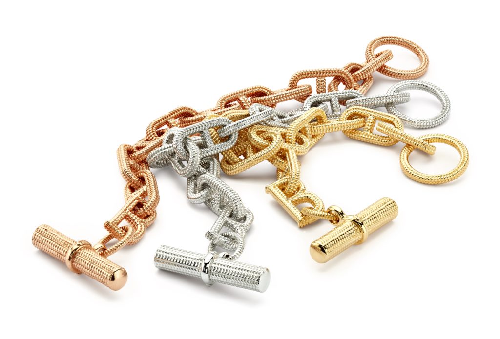 Nautical rope textured bracelet with signature “B” toggle in 18K white, yellow and rose gold, $12,500. 