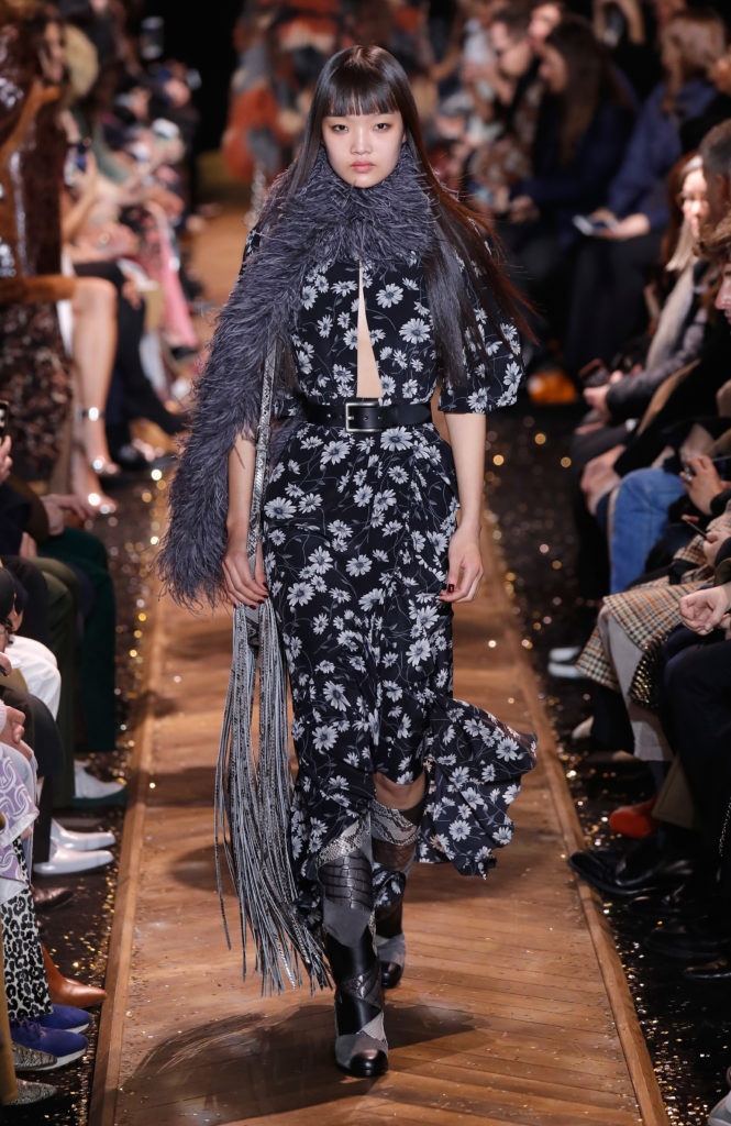 Michael Kors flora print dress with cutout and ostrich fur. (Photo by JP Yim/Getty Images for Michael Kors)