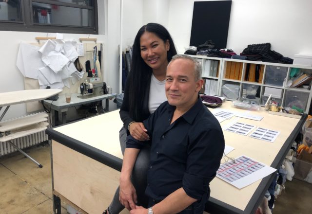 Kimora Lee Simmons and Cesar Galindo pose for a photo in the workroom of the Kimora Lee Simmons studio in New York. (Photo by Clifford Pugh)