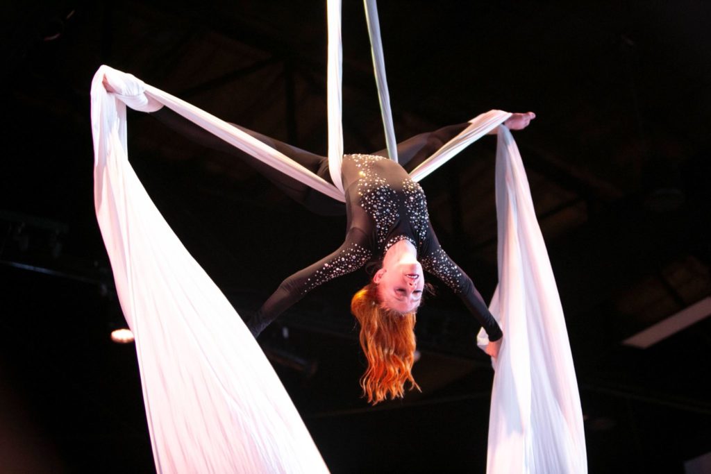 Aerialist Kenali Kendrick spins overhead while Mercury musicians perform French pieces. (Photo by Scott Villalobos, CatchLightGroup.com)