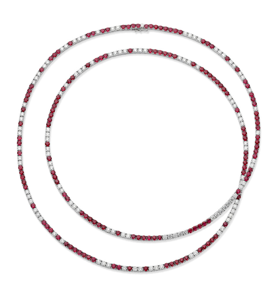 Long ruby and diamond necklace set in 18K white gold.