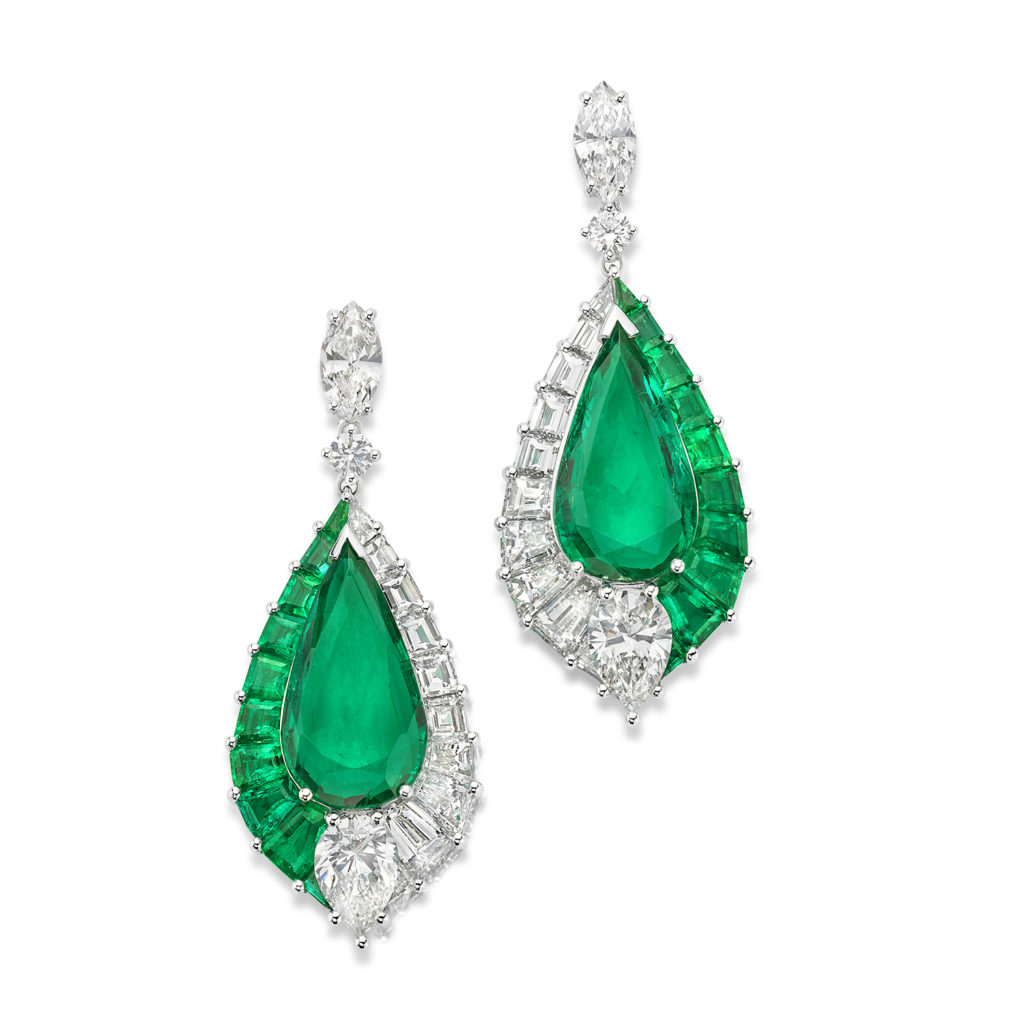 Emerald and Diamond Earrings with pear-shape emeralds surrounded by diamonds and emeralds in 18K white gold. 