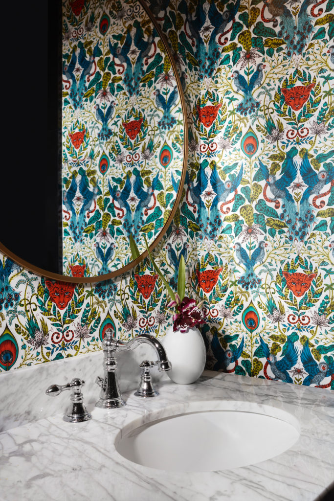 In the powder bathroom, Clarke & Clarke wallpaper from Duralee. (Photo by Lisa Petrole)