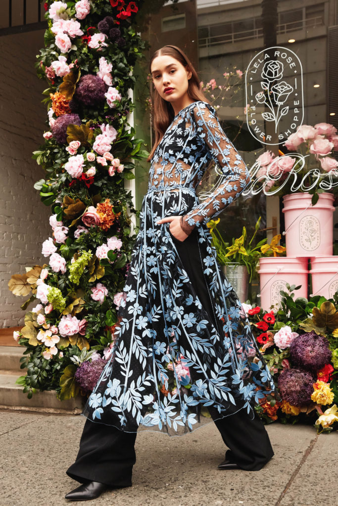 Lela Rose delphinium vine embroidered tulle overlay dress, black crepe trouser. (Photo by Taylor Jewell)