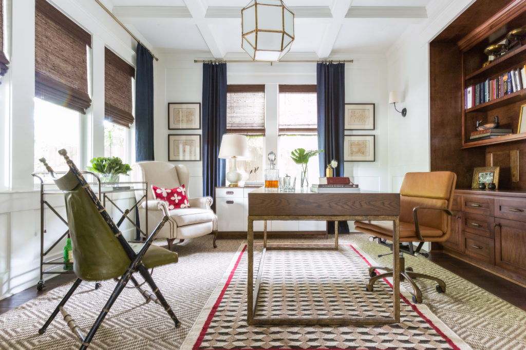The same home office, with the furniture rearranged and a different rug and chairs. (Photo by Julie Soefer)