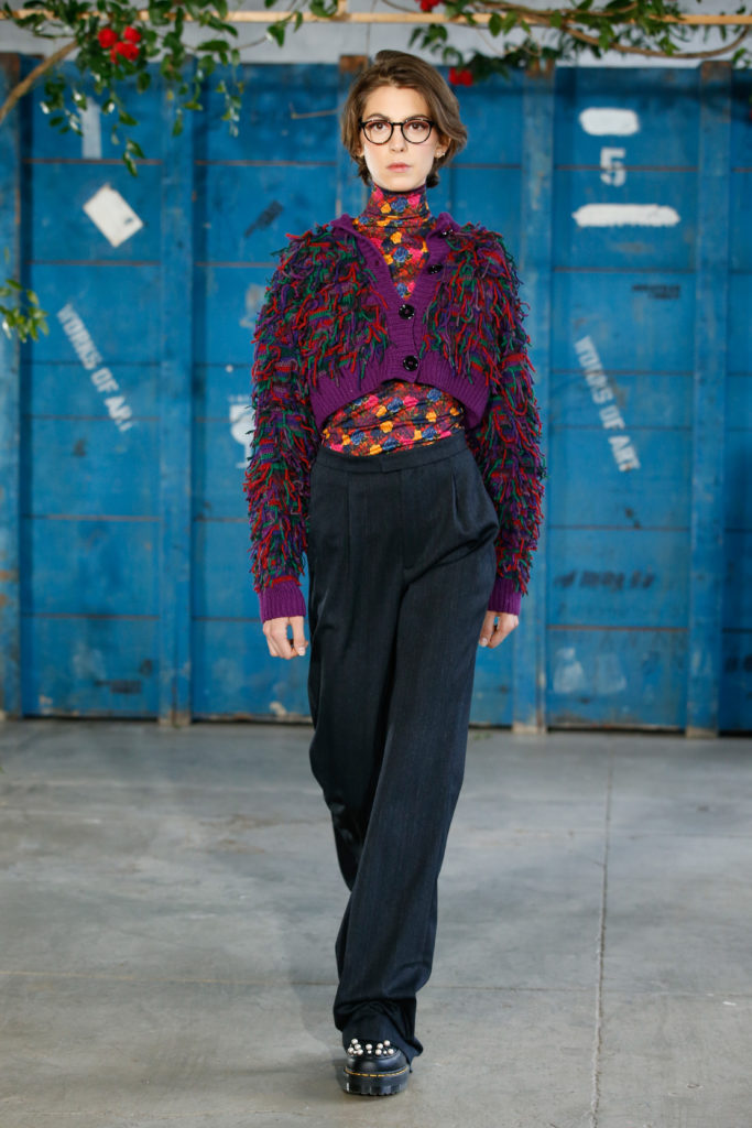 Jonathan Cohen floral blouse, black slacks, and cropped sweater made from recycled Italian cashmer. (Photo by Dan Lecca)