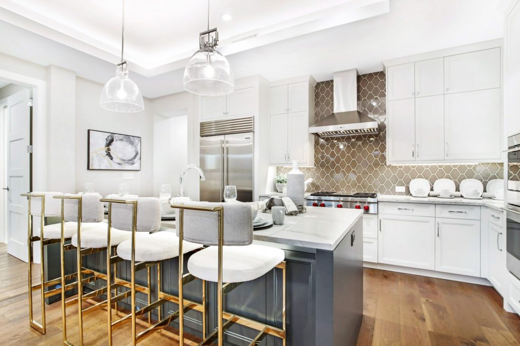 The Parkview Residences gourmet kitchens feature Sub-Zero and Wolf appliances, custom cabinetry and natural stone waterfall islands. 