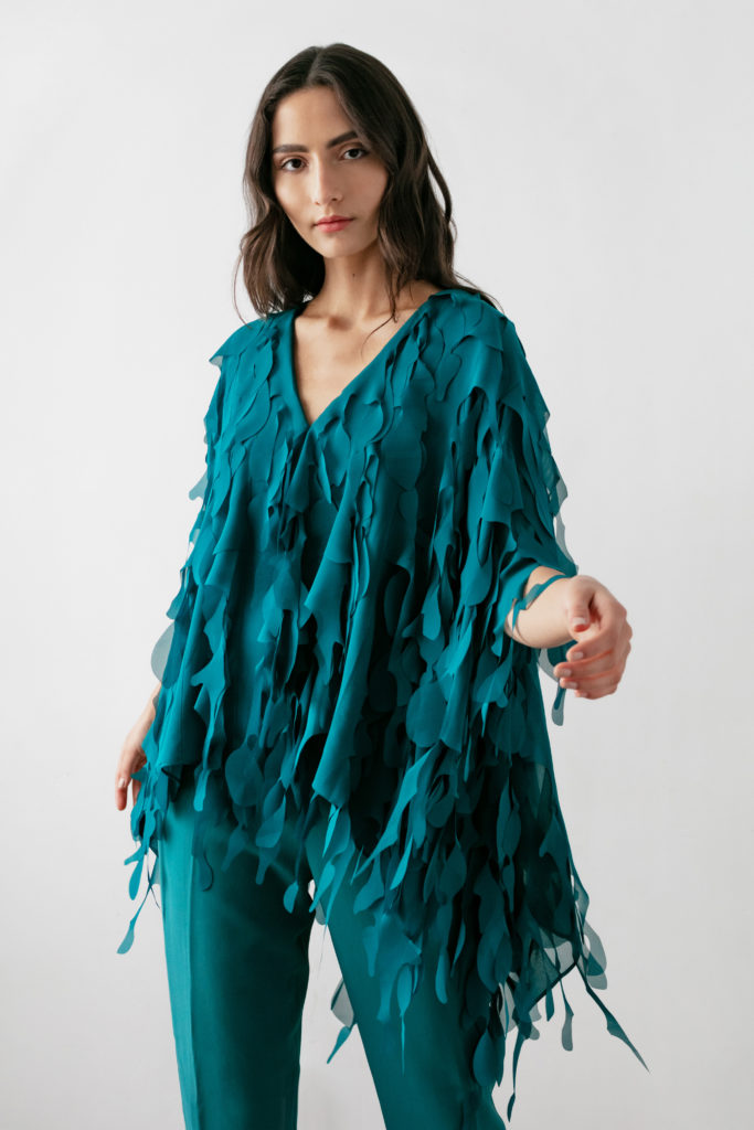 Catherine Regehr teal V-neck blouse. (Photo courtesy of Catherine Regehr)