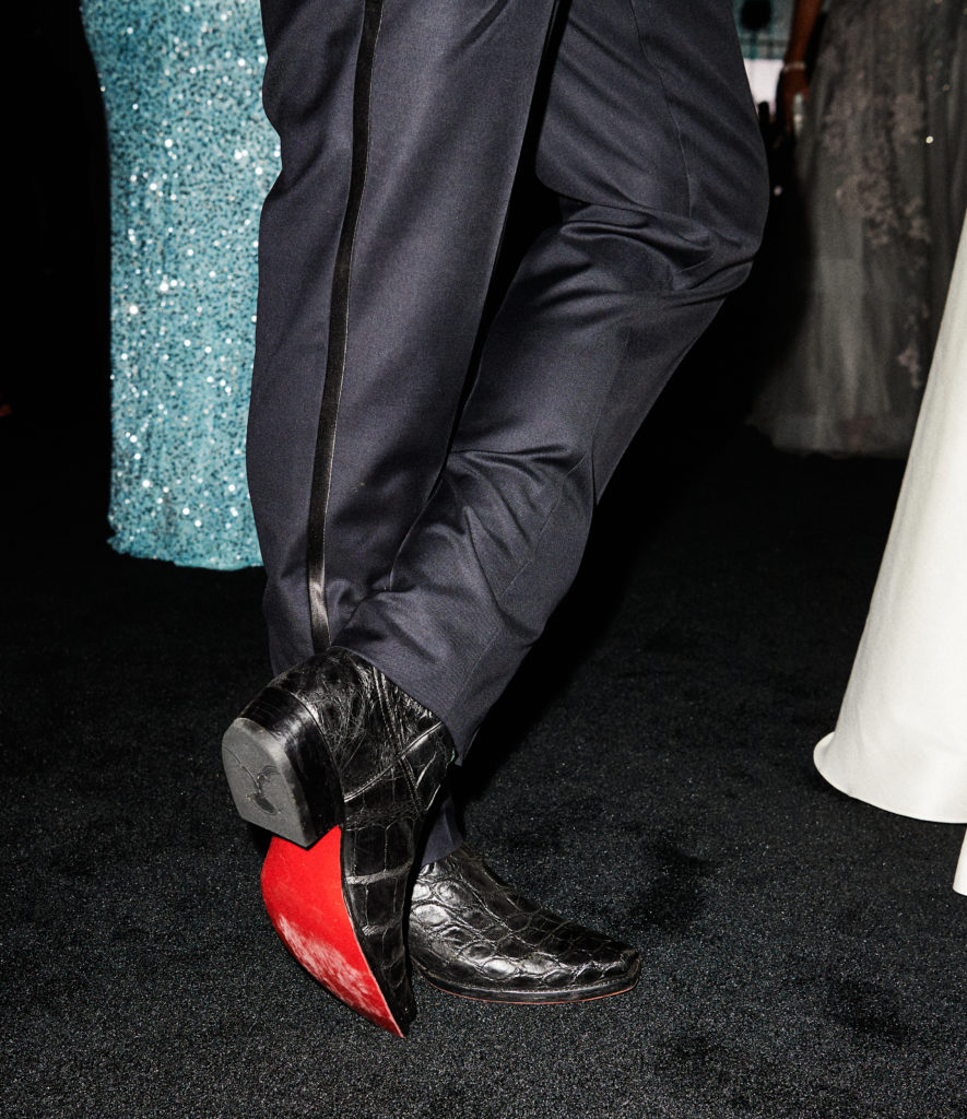Red bottom boots are the perfect footwear choice for guests that evening. (Photo by Jonathan Zizzo)
