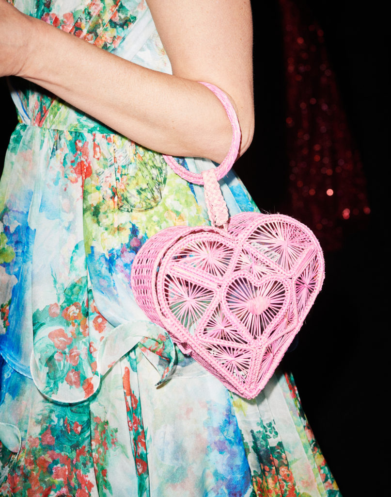 A pink heart-shaped bag proves to be the perfect accessory for a night on the town. (Photo by Jonathan Zizzo)