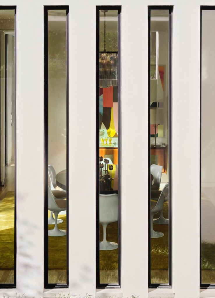 A glimpse of dining room through courtyard windows. (Photo by Lisa Petrole)