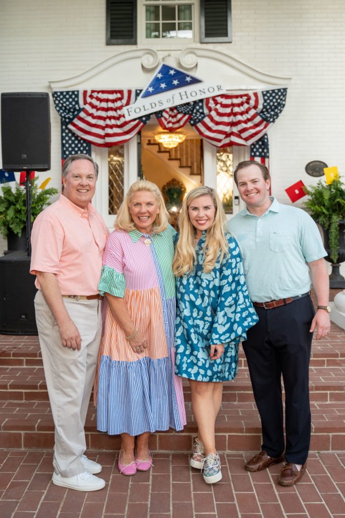 Folds of Honor kickoff party hosts and honary chairs Rusty and Molly Reid share a moment with Sainty Nelsen and Jake Reid. (Photo by Danny Campbell)