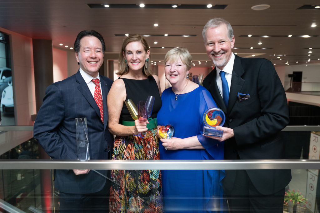 Frost Bank's Ronald Joe, gala chair Stephanie Tsuru, honoree Leslie Blanton, honoree Matthew Loden at the ROCO Revelry gala dinner at Porsche River Oaks. (Photo by Daniel Ortiz)
