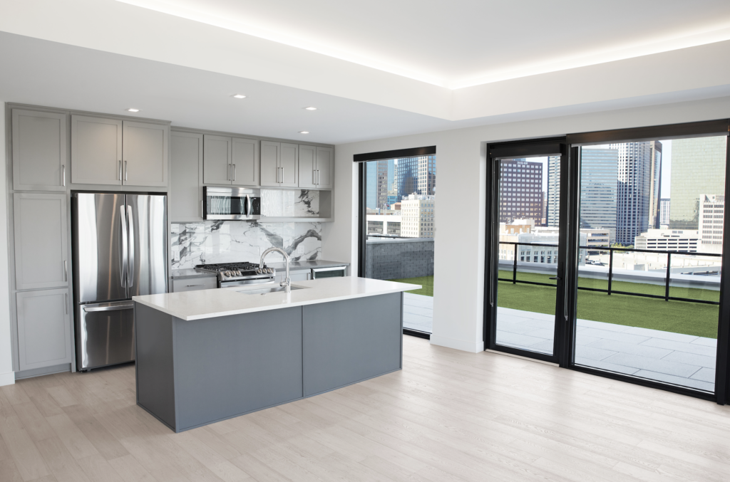 Each floor in the tower alternates between a dark, quartz gray aesthetic and a sleek white aesthetic.
