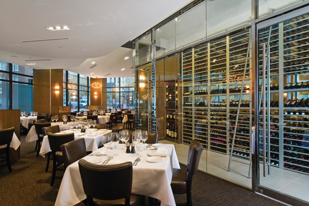 The glass fronted wine cave at Grace along Main Street in Fort Worth.