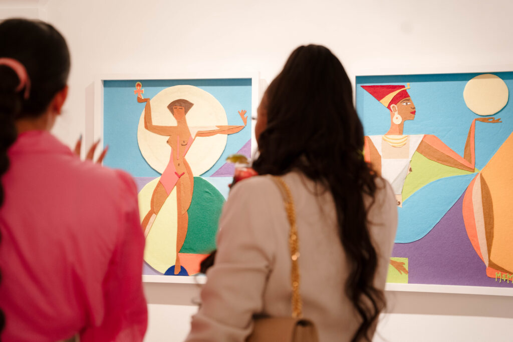 Taking in the art at "Colorful Wave, White Sea" dinner at W.A.A.S. Gallery (Photo by Demetri Sheffield)