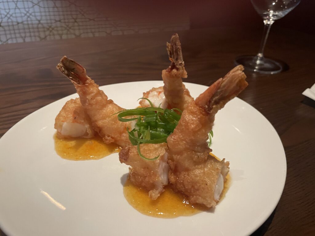 Fleming's new social hour menu features a tempura shrimp dish.