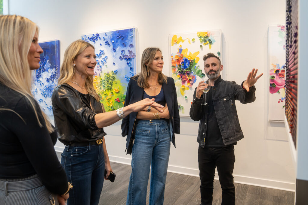 Andrew Zolty, co-founder of BREAKFAST Kinetic Art Studio, with guests. 