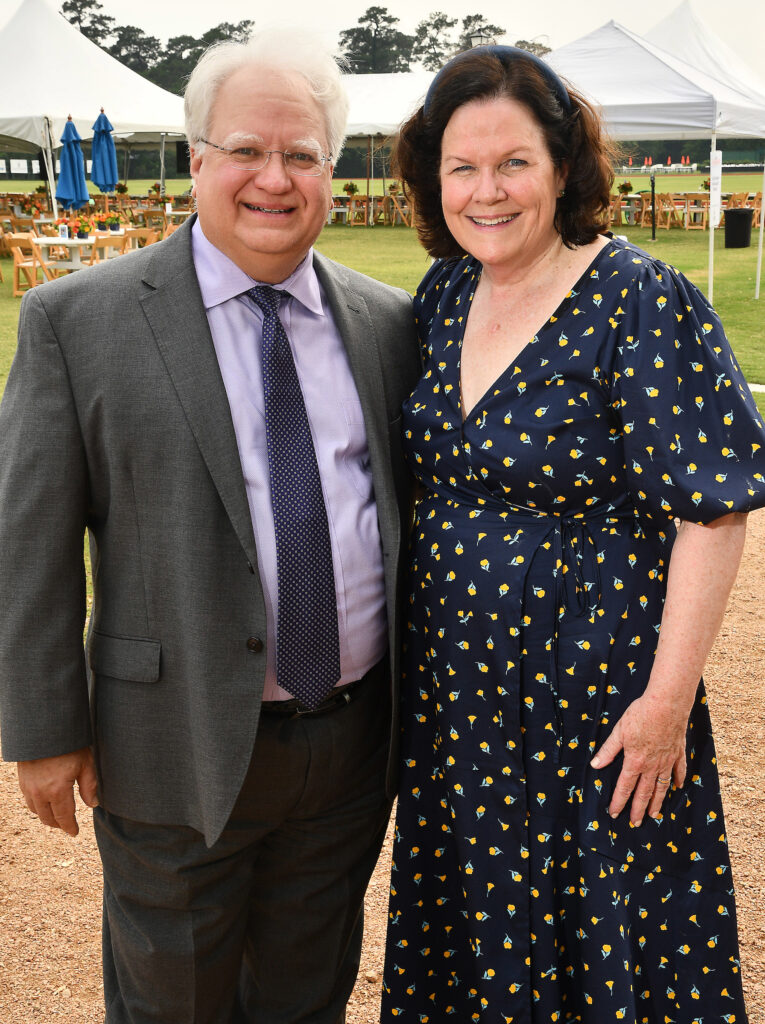 David Pluchinsky, Bo's Place executive director Mary Beth Staine at the Bo's Place Hats, Hearts & Horseshoes Kentucky Derby party at Houston Polo Club. (Photo by Dave Rossman)
