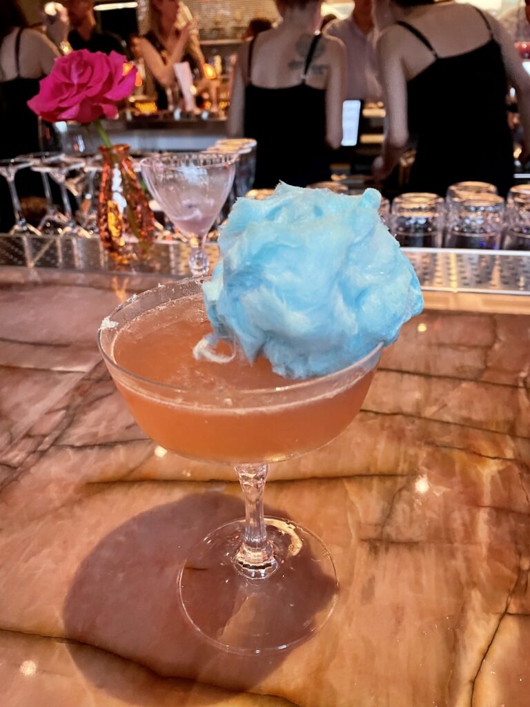 Cocktails dazzle like the Ooh La La tipped with cotton candy. (Photo by Courtney Dabney)