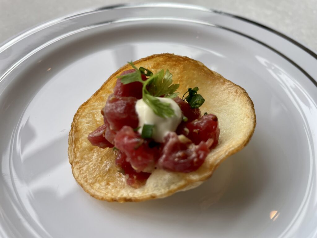 Prime beef tartare is served atop a crispy potato chip. (Photo by Courtney Dabney)