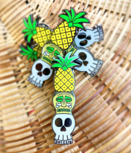 Pick-up a souvenir while at Swizzle like this charming enamel pin.