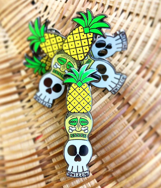 Pick-up a souvenir while at Swizzle like this charming enamel pin.