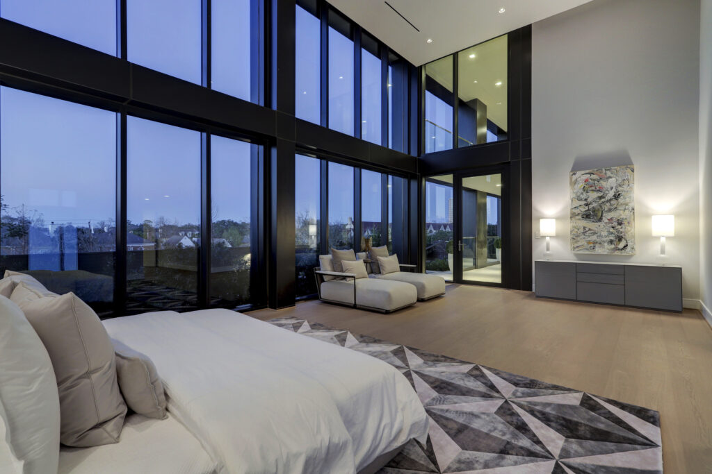 The unit boasts two primary bedrooms, including one on the first floor off the private terrace with floor to ceiling windows. 