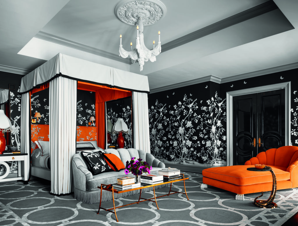 RuPaul's bedroom, designed by Martyn Lawrence Bullard, with snake table from Blackman Cruz, Dorothy Draper plaster chandelier and rug from The Rug Company.  (Photo by Douglas Friedman)