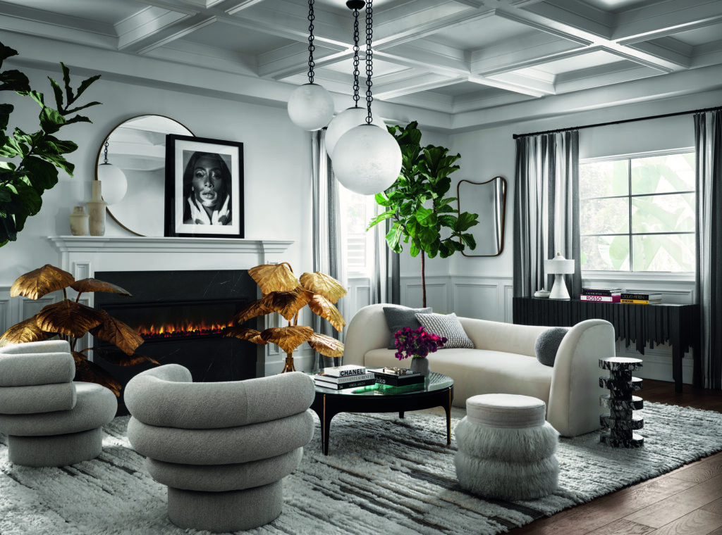 Winnie Harlow's living room with Tommaso Barbi brass leaf lamps, designed by Martyn Lawrence Bullard. (Photo by Douglas Friedman)