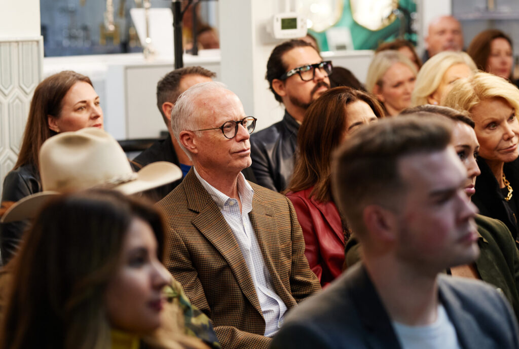Ed Hill in the audience at Monogram event at Capital Distributing