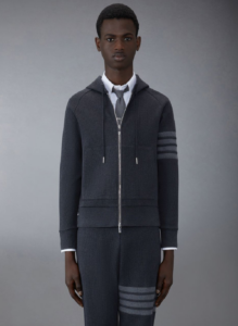 Thom Browne 4-bar gray on gray zip-up hoodie, $1,350, available at Thombrowne.com