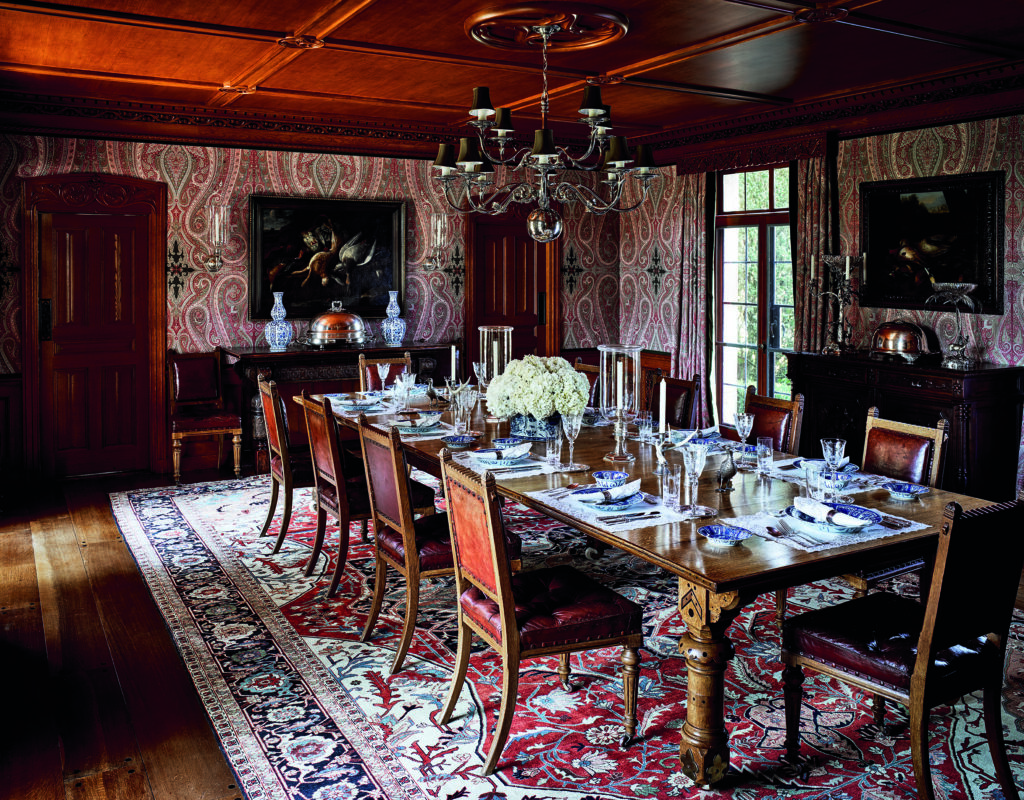 The dining room of Tommy and Dee Hilfiger's Connecticut house has Pasha Paisley wool from MLB's Schumacher collection. Dutch silver chandelier.  (Photo by Douglas Friedman)